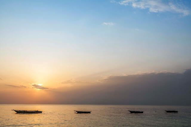 Four Boats at Sunset