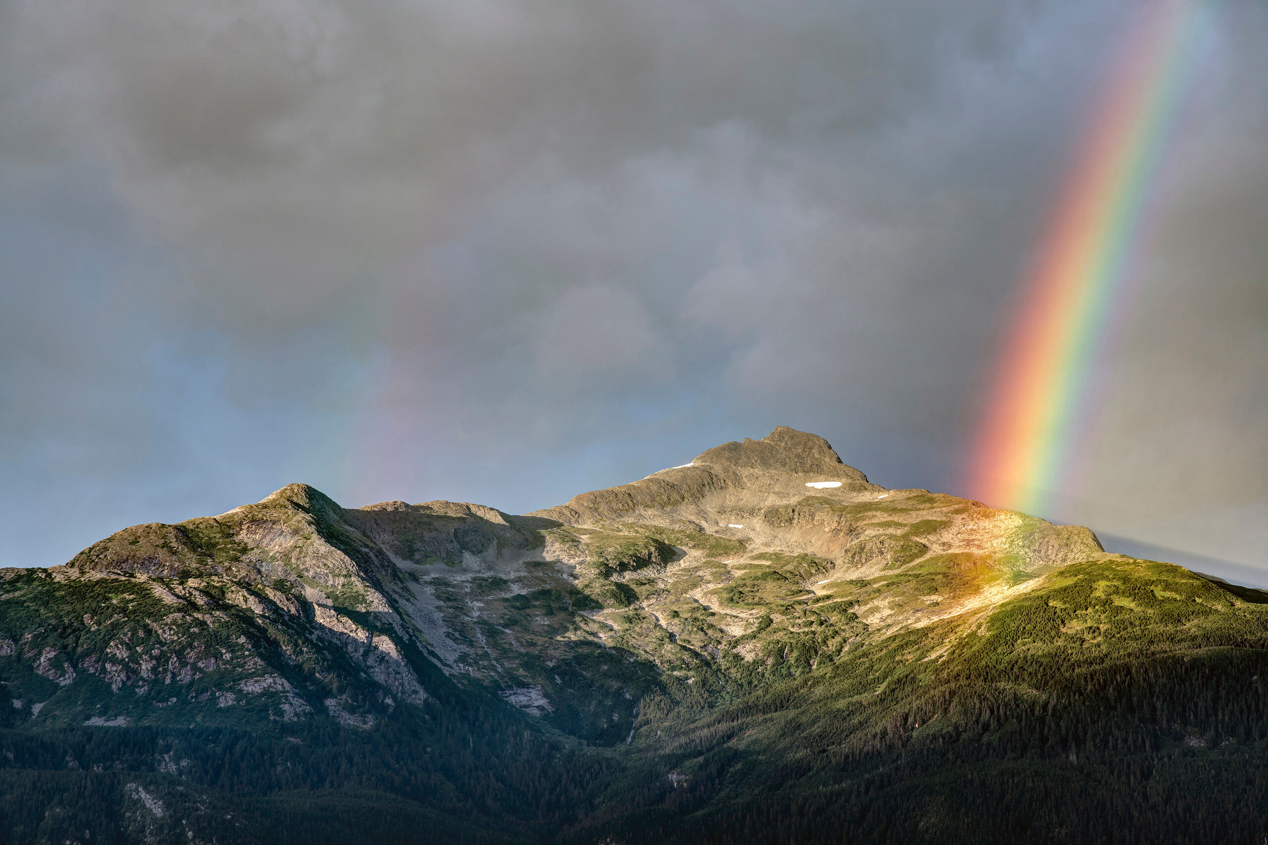 Mount Villard Rainbow I'd left my campsite in Haines, Alaska one evening in order to go up the road to take sunset photos. After only a minute or...