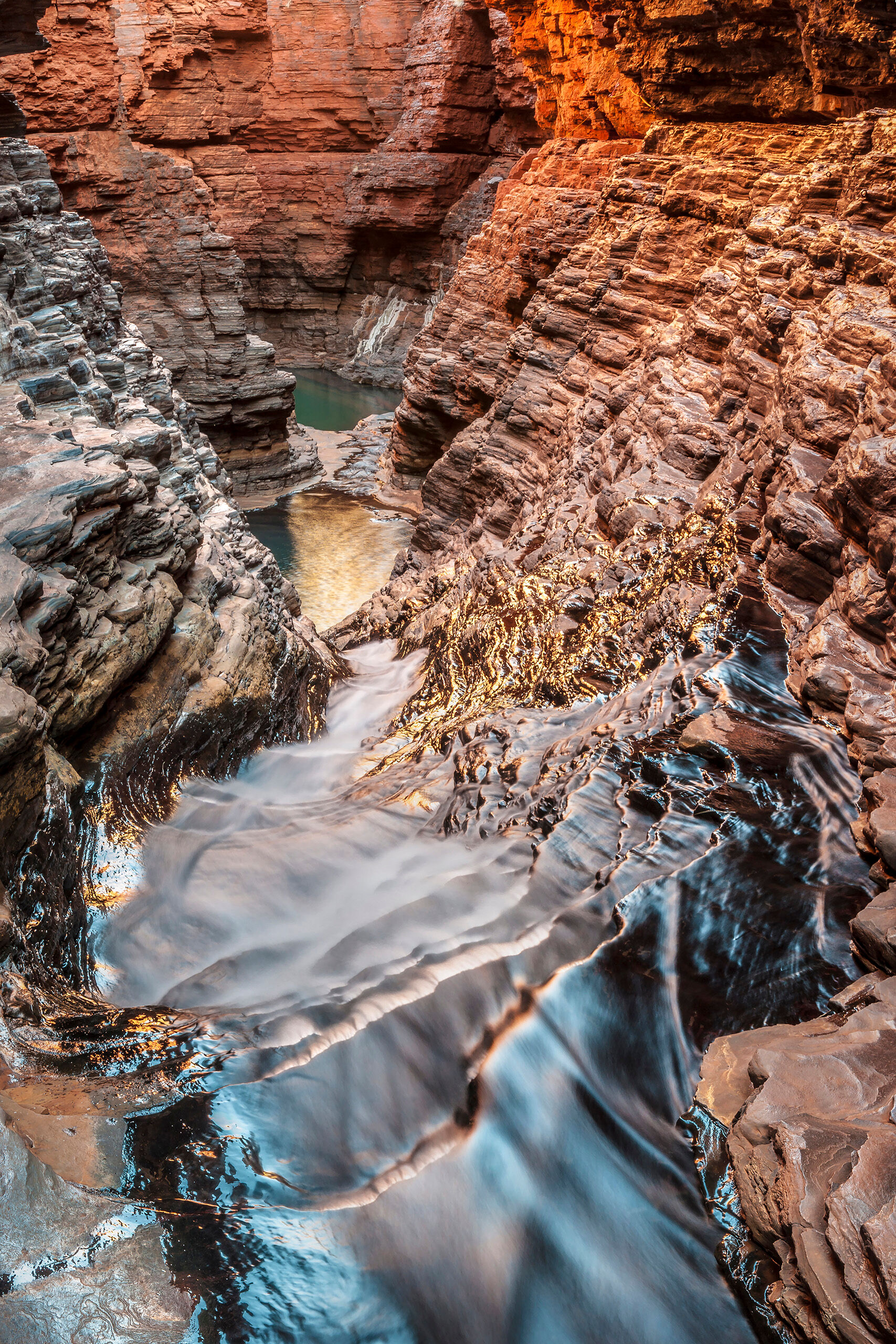 Karijini Slot Canyon Western Australia's Karijini National Park is a bit difficult to get to, not least because of its remote location, in the far...