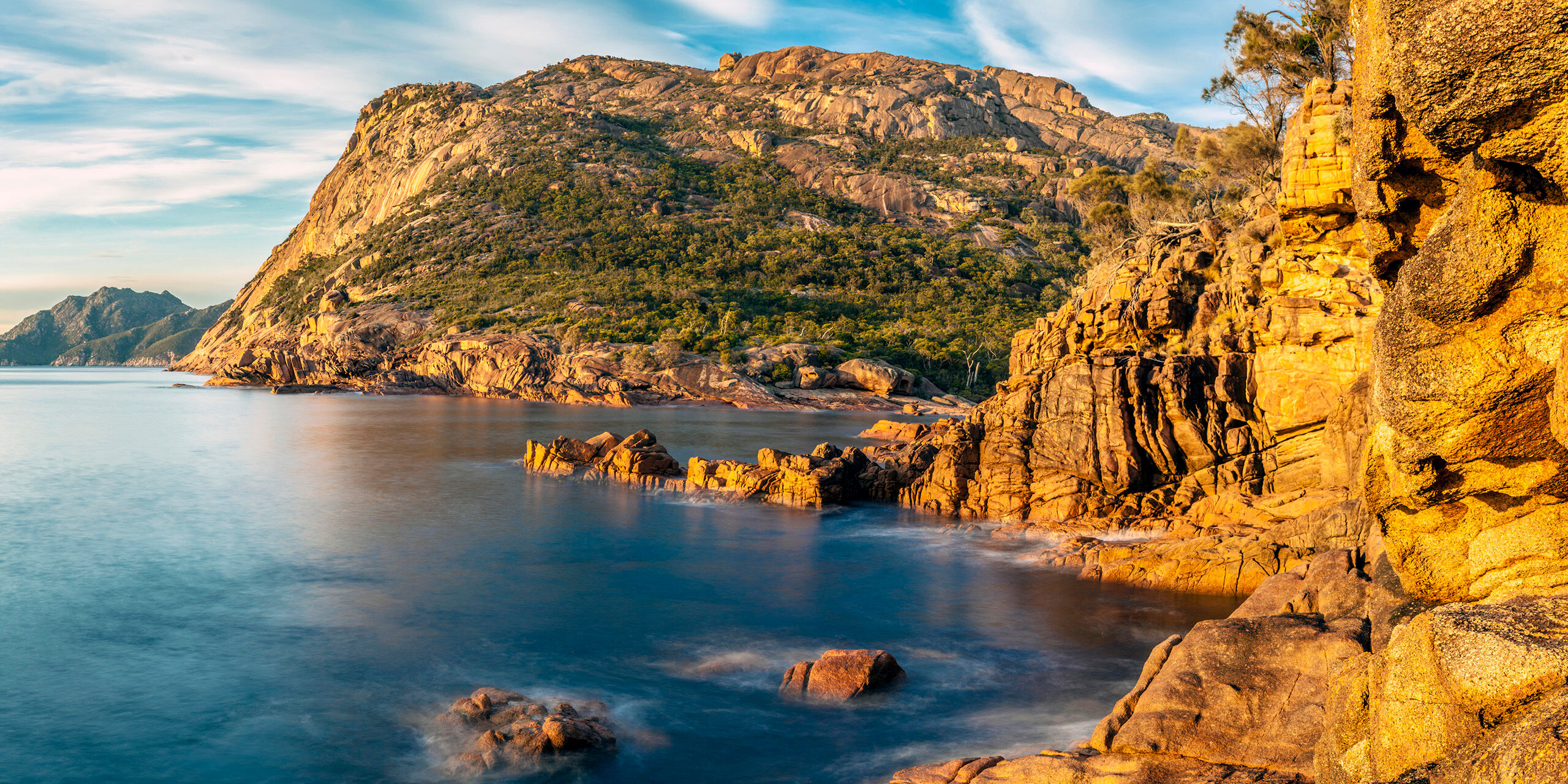 Sleepy Bay Sunrise Frecinet National Park, located on a small peninsula on the east coast of Tasmania, Australia, is one of the most photogenic...
