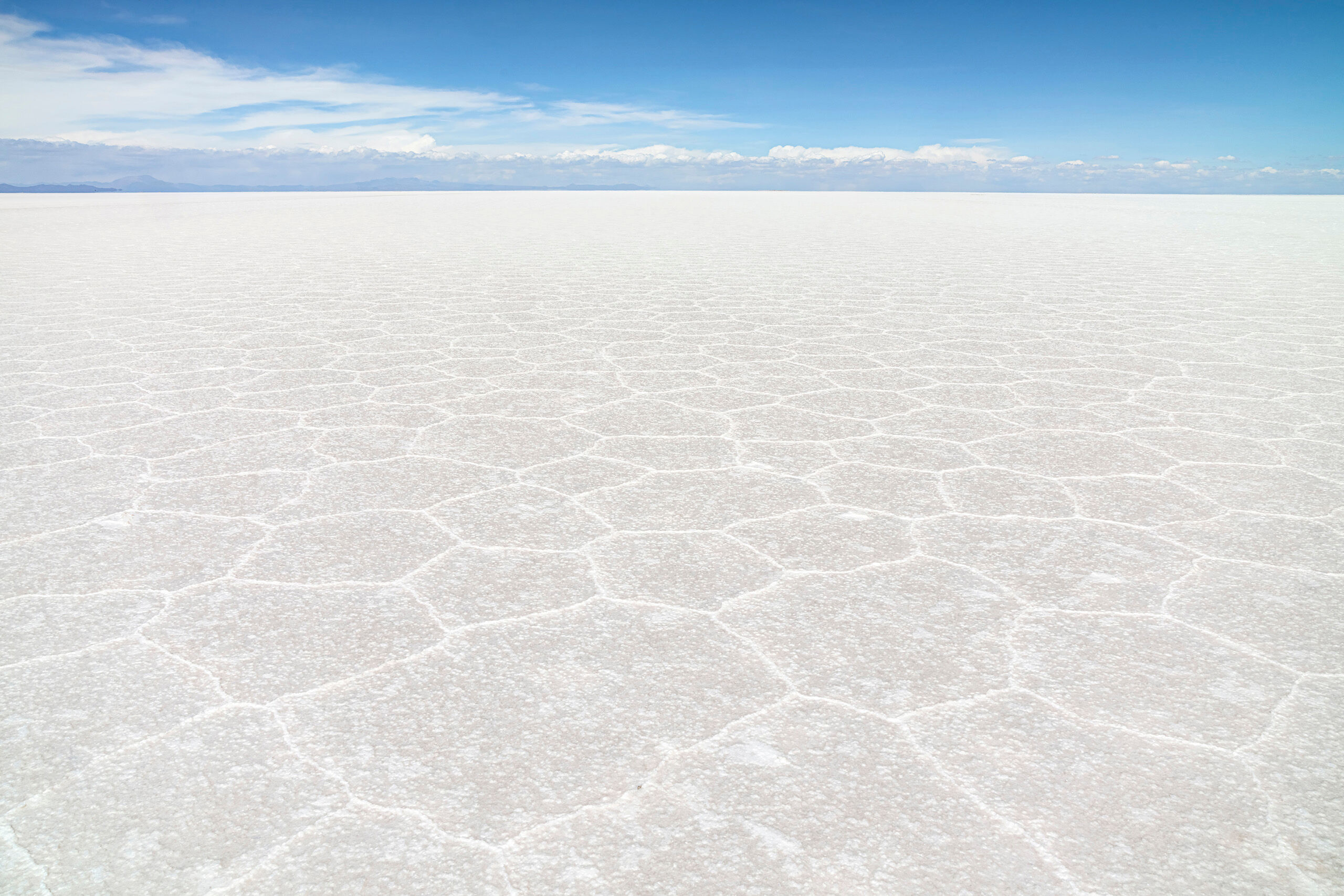 El Salar Sitting at roughly 12,000 feet above sea level, the Salar de Uyuni is, at over 3,900 square miles, the world's largest salt flat...