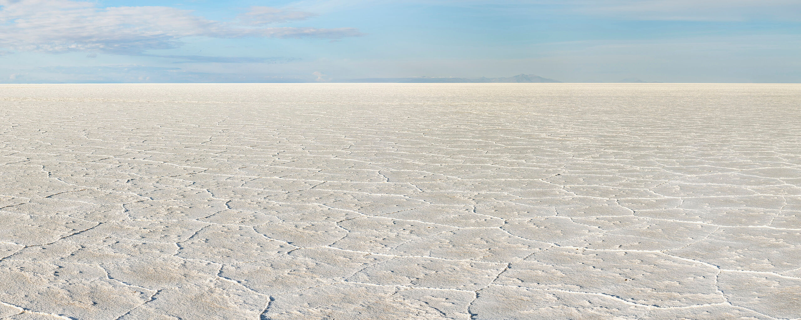 Endless Sitting at roughly 12,000 feet above sea level, the Salar de Uyuni is, at over 3,900 square miles, the world's largest salt flat...