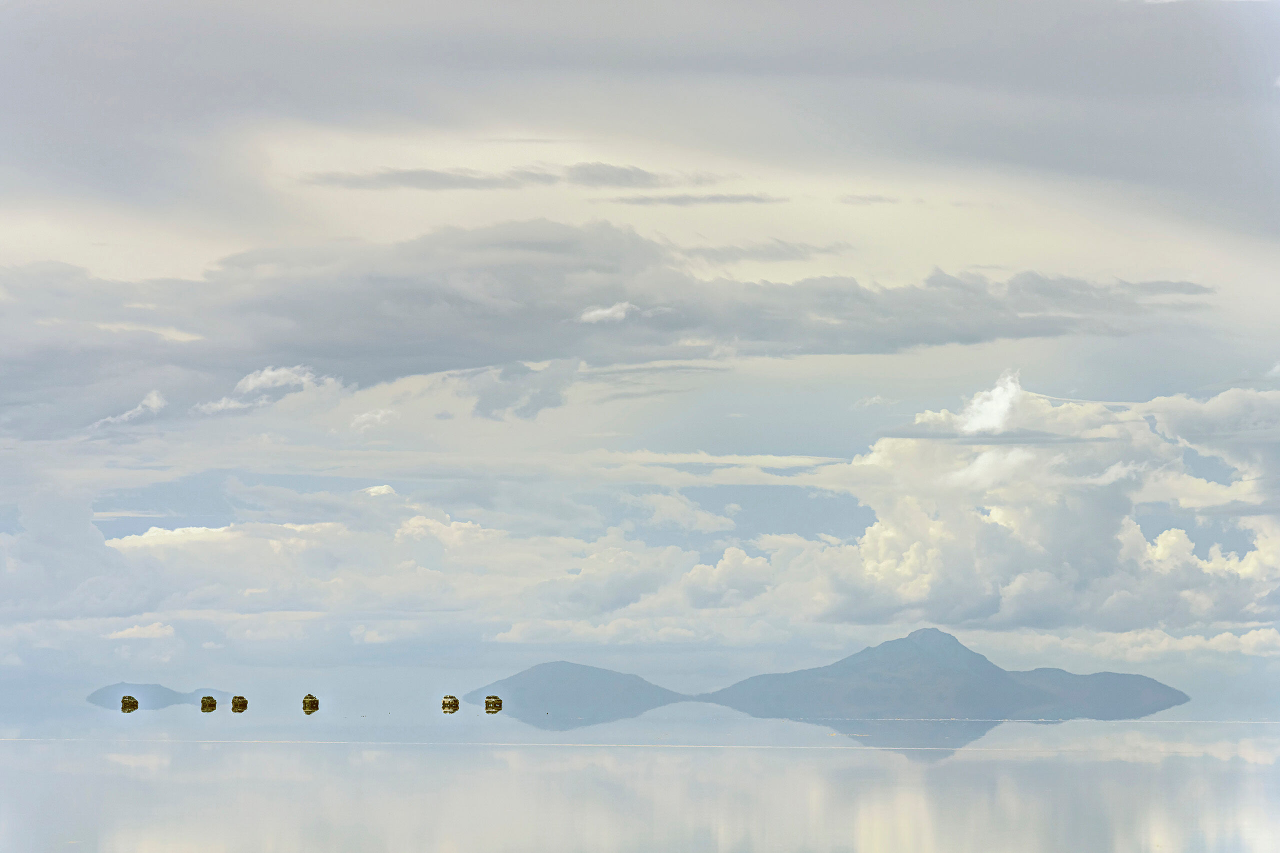 Of Course They're Land Cruisers Sitting at roughly 12,000 feet above sea level, the Salar de Uyuni is, at over 3,900 square miles, the world's largest salt flat...