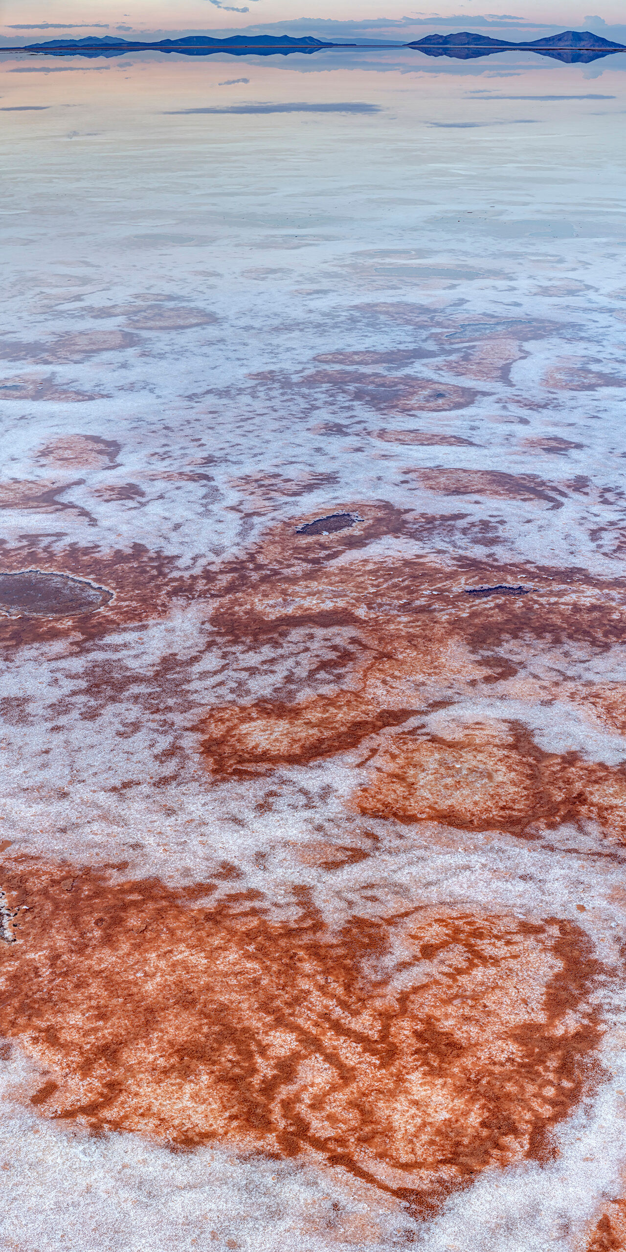This Can't Be Earth Sitting at roughly 12,000 feet above sea level, the Salar de Uyuni is, at over 3,900 square miles, the world's largest salt flat...