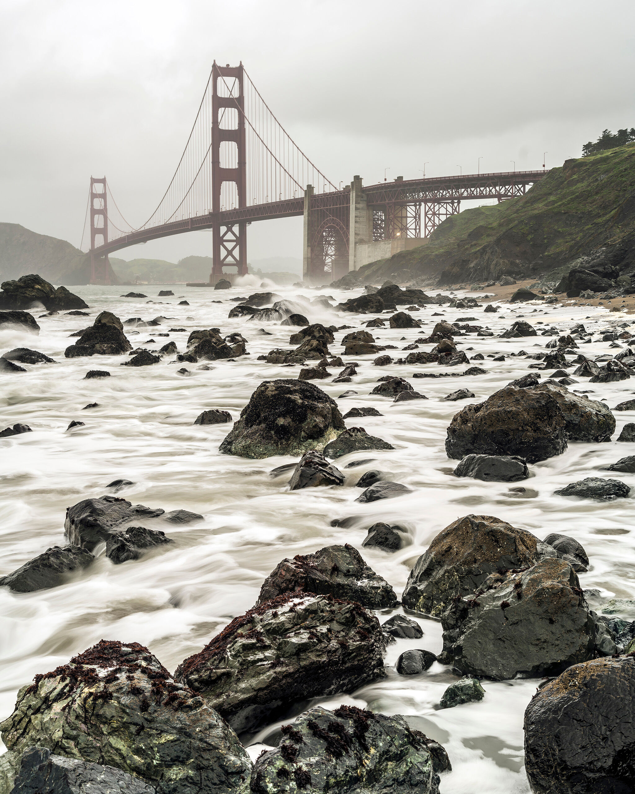 Golden Gate Bridge and Marshall's Beach Marshall's Beach, which lies southwest of the Golden Gate Bridge, is a hazardous place to walk around because of the many sharp...