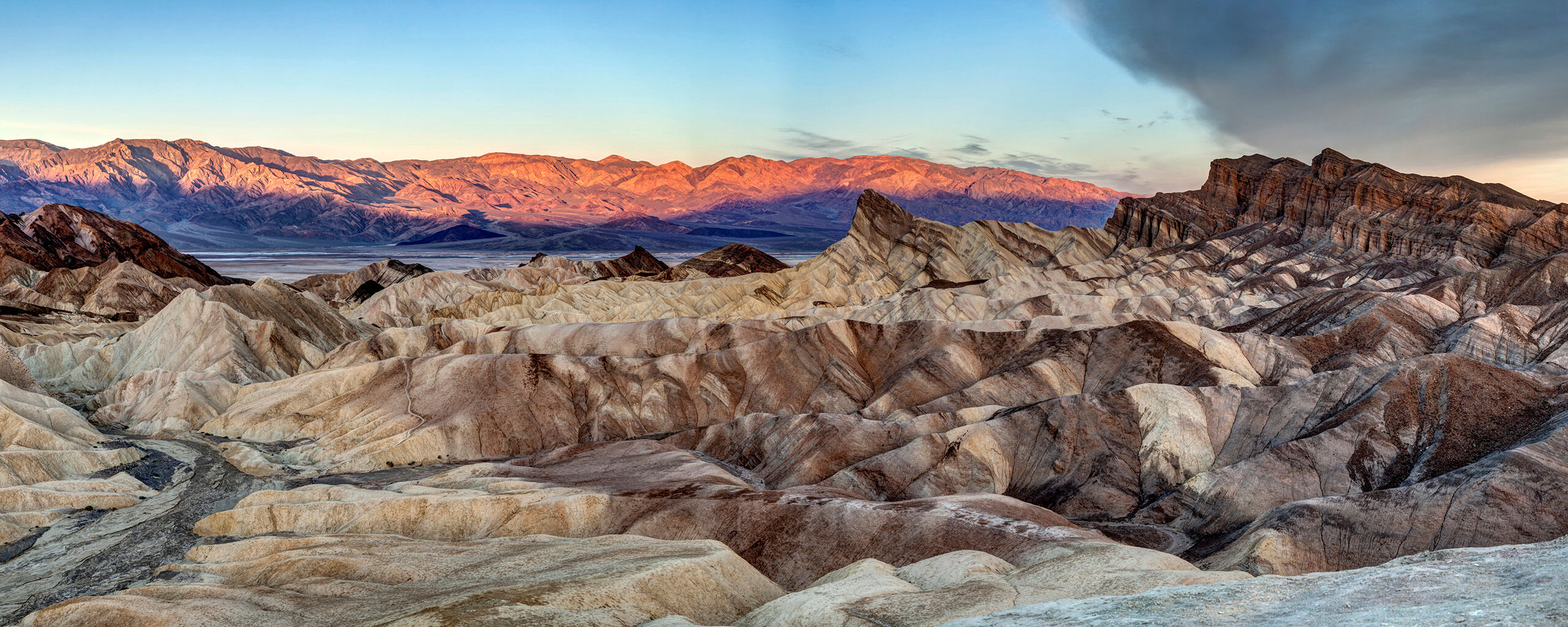 West of Zabrinskie Point I took this photo looking west at the Panamint Range from Death Valley's Zabrinskie Point, minutes after sunrise, one morning...