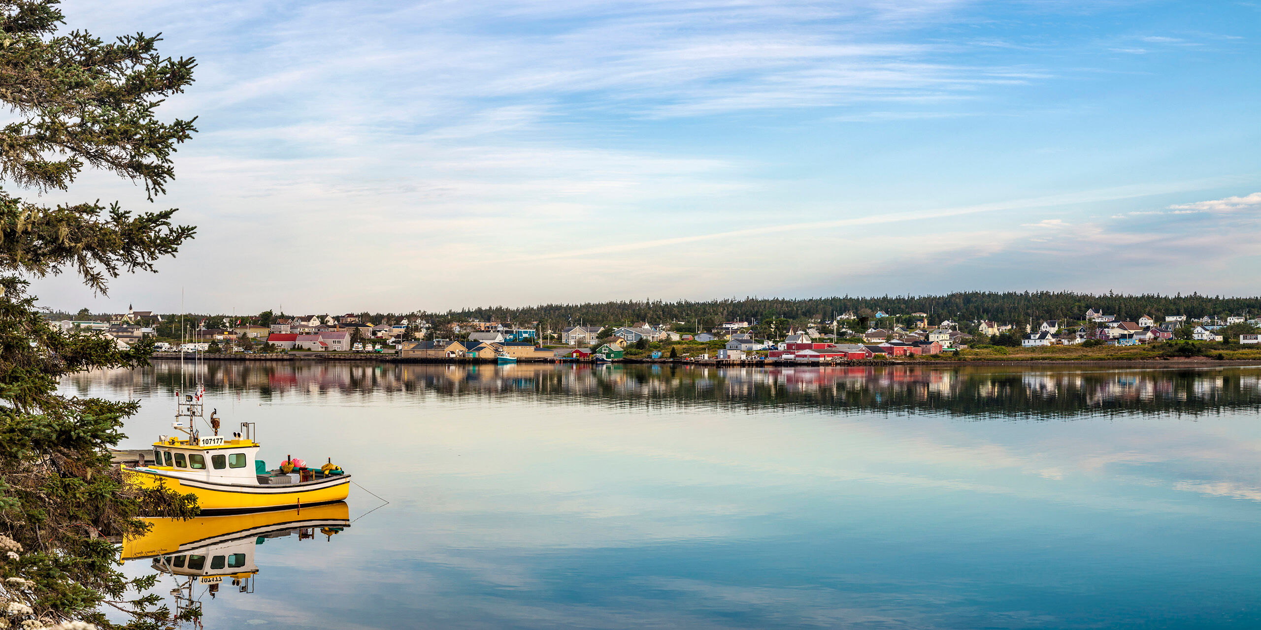 Louisbourg Harbor Reflection I really love this photo. I couldn't have asked for the water to be smoother when I took this photo shortly after sunrise on...