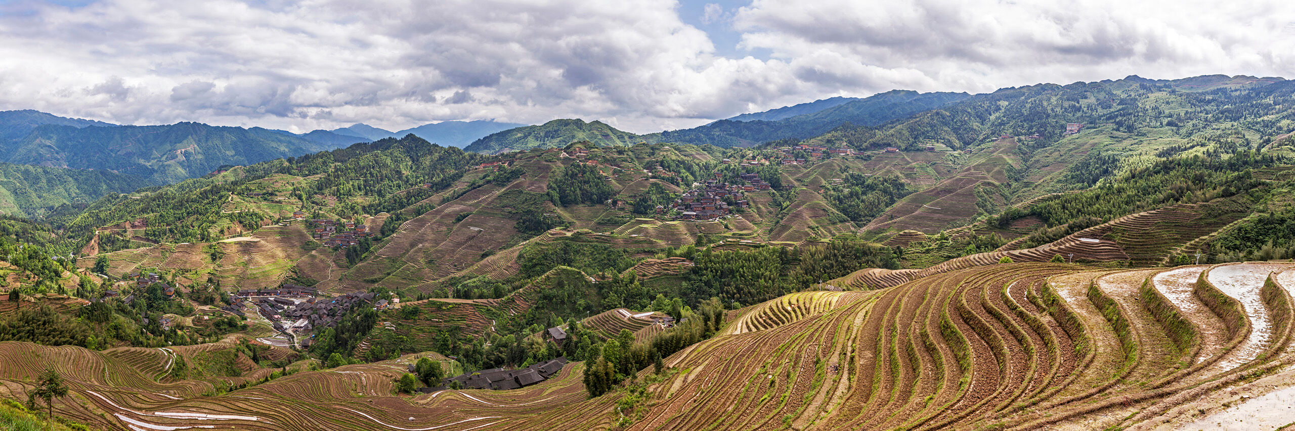 Longji Rice Terraces Panorama 1 The Longji (sometimes called Longsheng) Rice Terraces, in Guangxi Province, China, are beautiful, and reminiscent of a nearly...