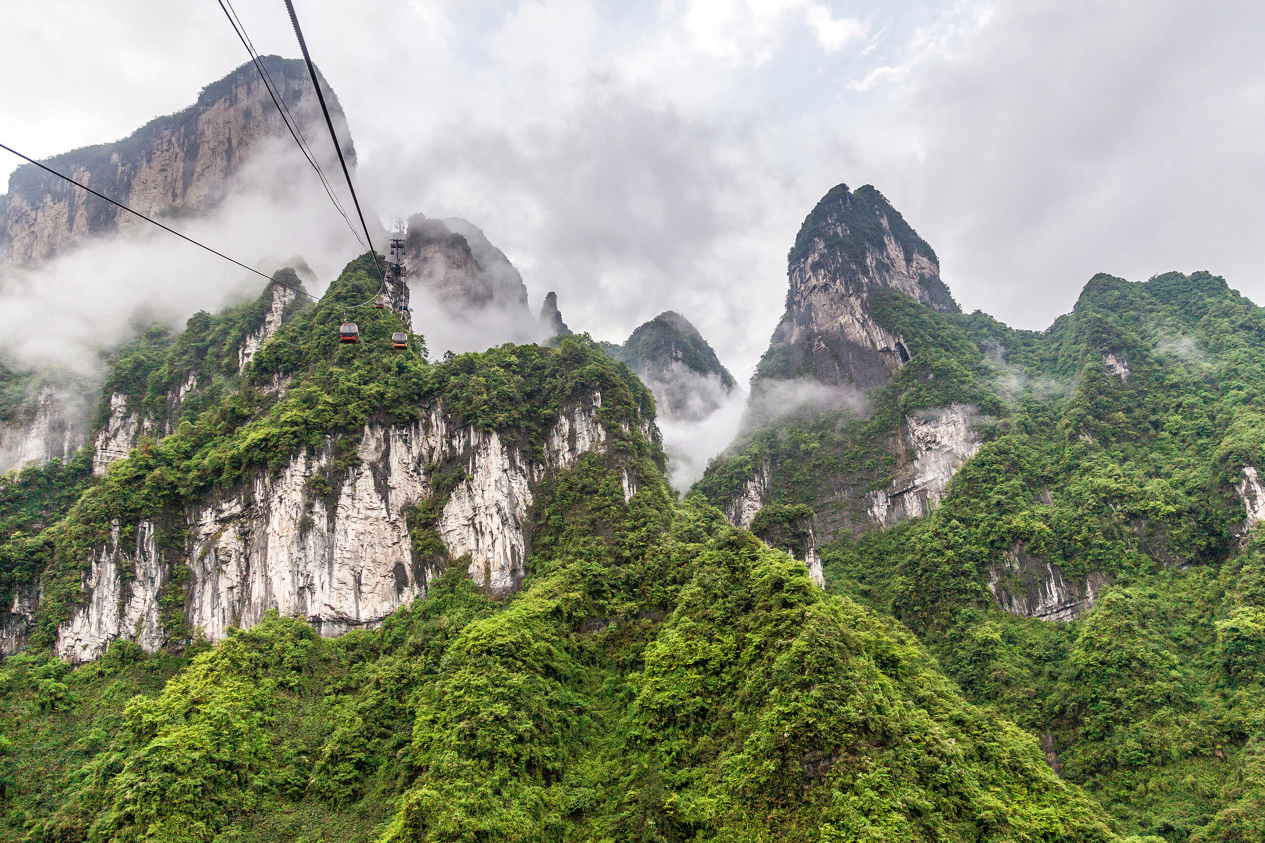 Tianmen Mountain Cable Car Tianmen Mountain National Park, a couple hours north of Hong Kong, is a beautiful place, although frequently socked in by clouds...