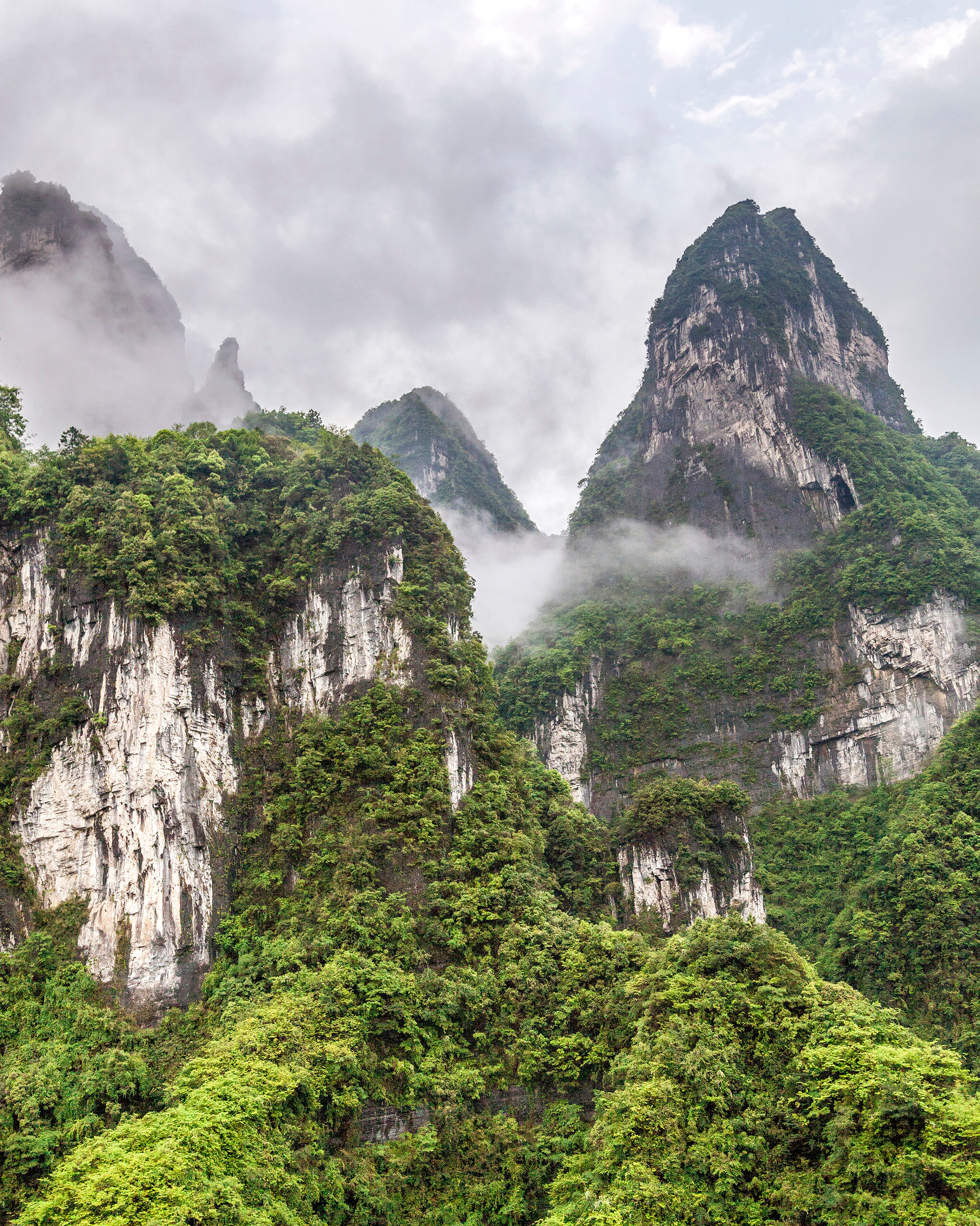 Tianmen Mountain Portrait Tianmen Mountain National Park, a couple hours north of Hong Kong, is a beautiful place, although frequently socked in by clouds...