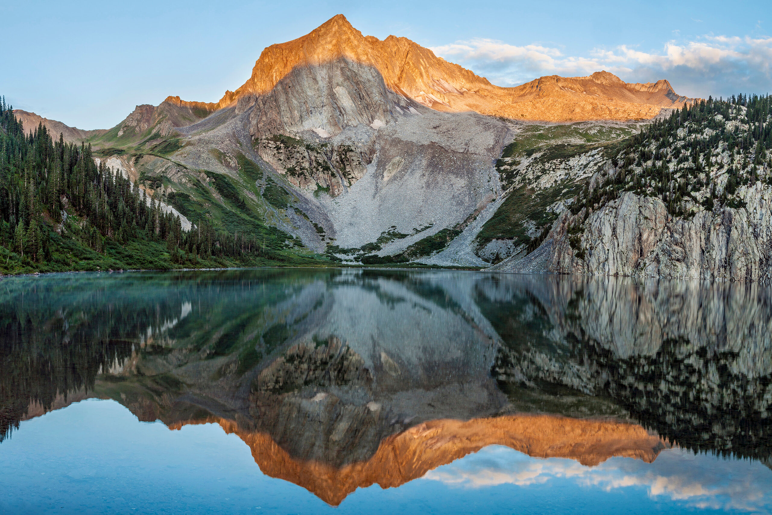 Snowmass Reflection Sunrise at Snowmass Lake, with Snowmass Mountain reflected on the surface. This is where a friend and I camped our first night...