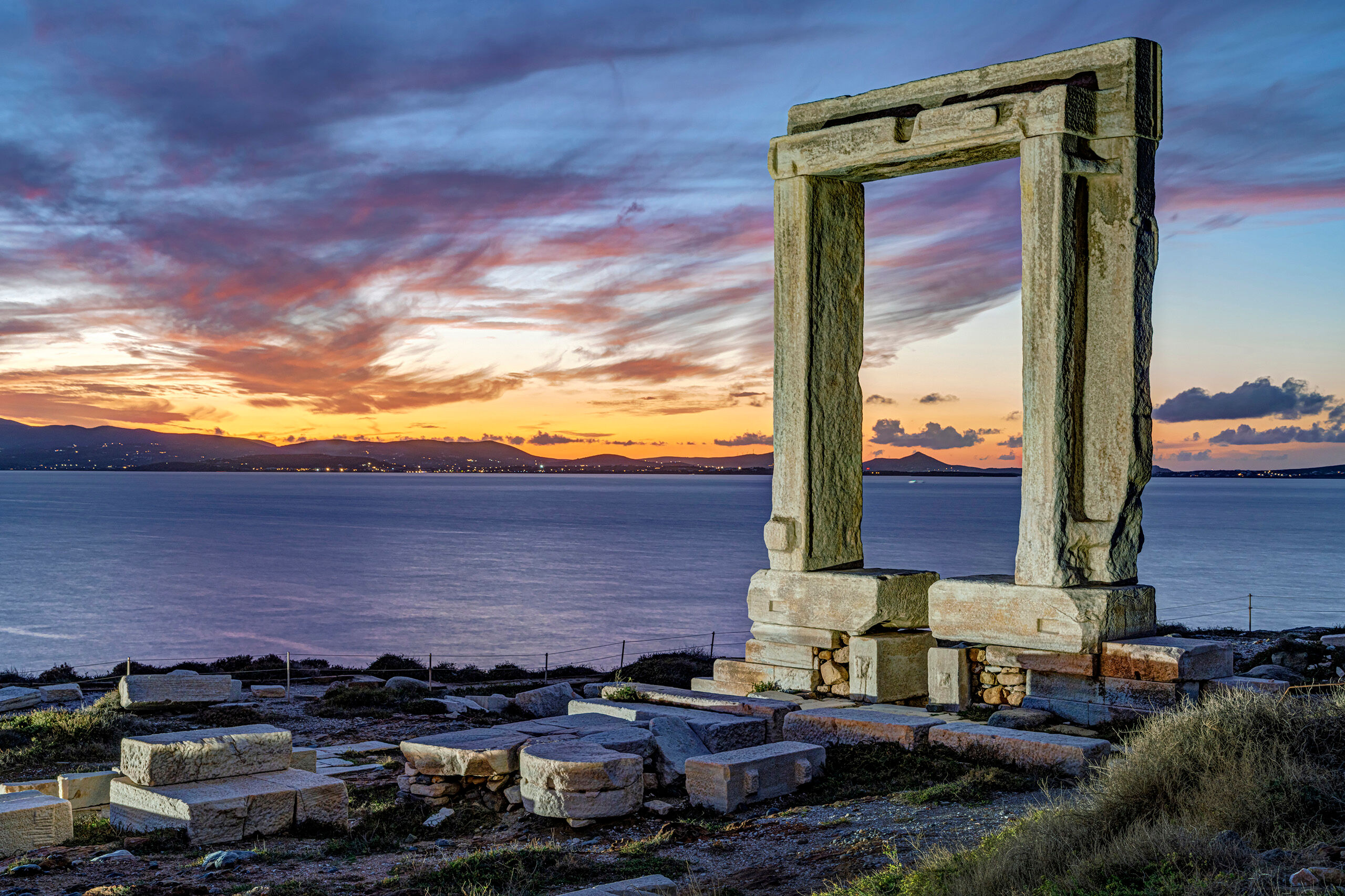 Temple of Apollo Gate Dusk Naxos is a small island in the Greek archipelago, and the main city on the island, conveniently also named Naxos (confusingly...