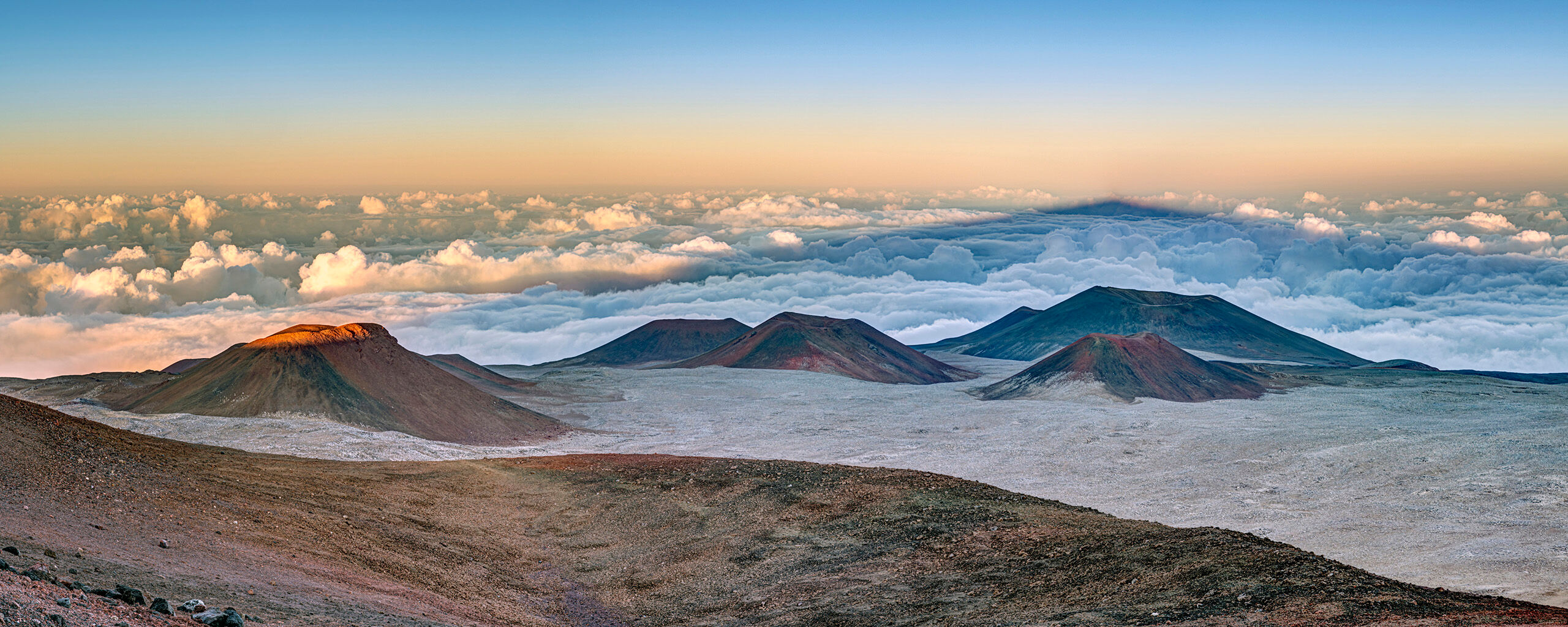 In the Shadow of a Giant Mauna Kea, on the Big Island of Hawai'i, rises to just under 14,000 feet in elevation, and feels like another planet. I drove...