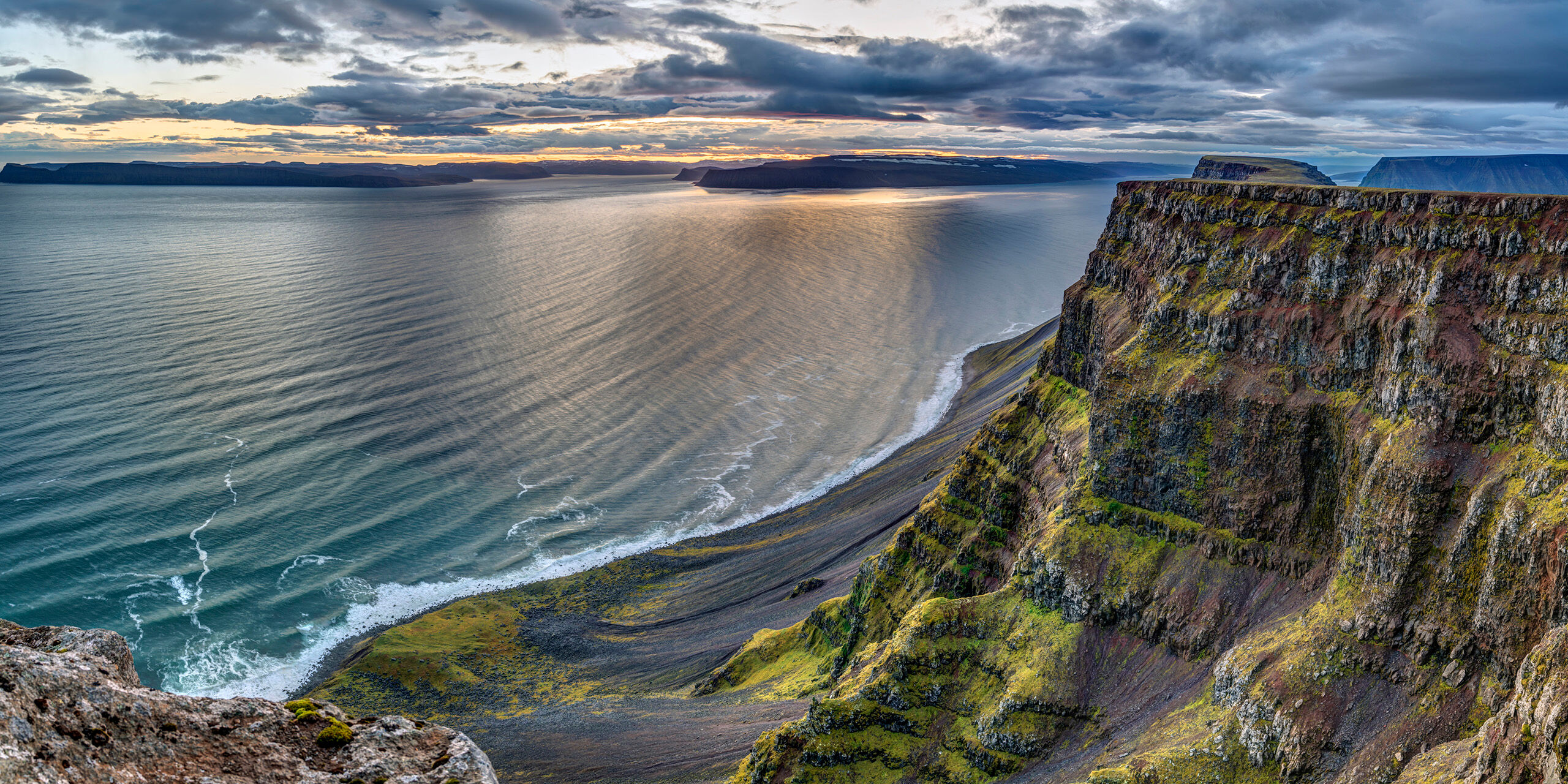 Bolafjall Sunrise Bolafjall is a 2,000 foot high, flat-topped mountain in Iceland's West Fjords. I took this photo from the top of Bolafjall, which...