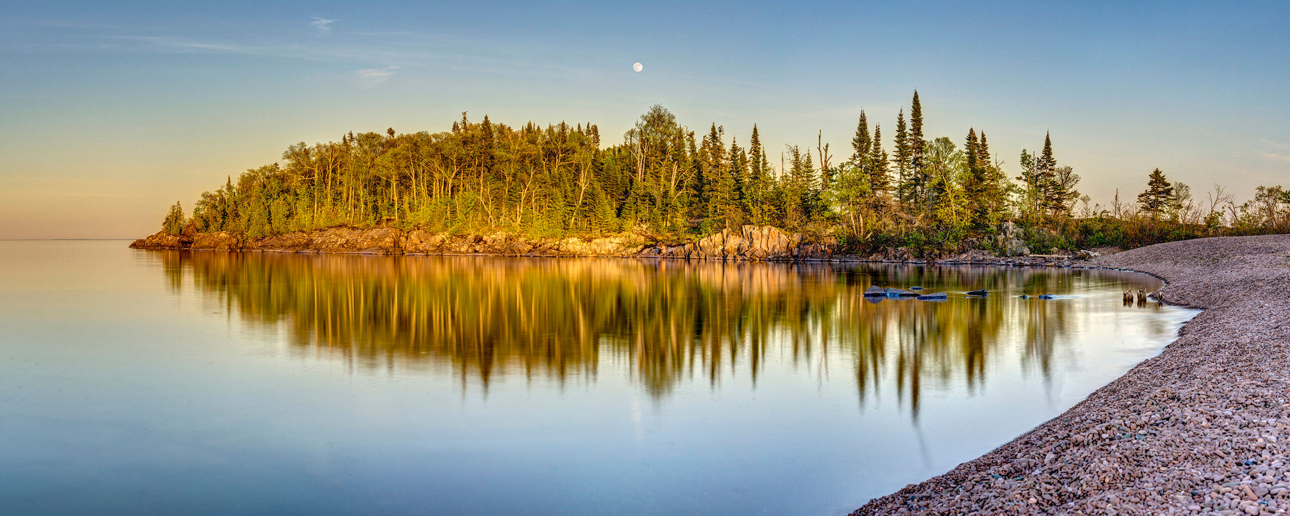 Artists' Point Sunset Artists' Point, in Grand Marais, Minnesota, lies on Lake Superior's beautiful North Shore, a mere 40 miles from the Canadian...