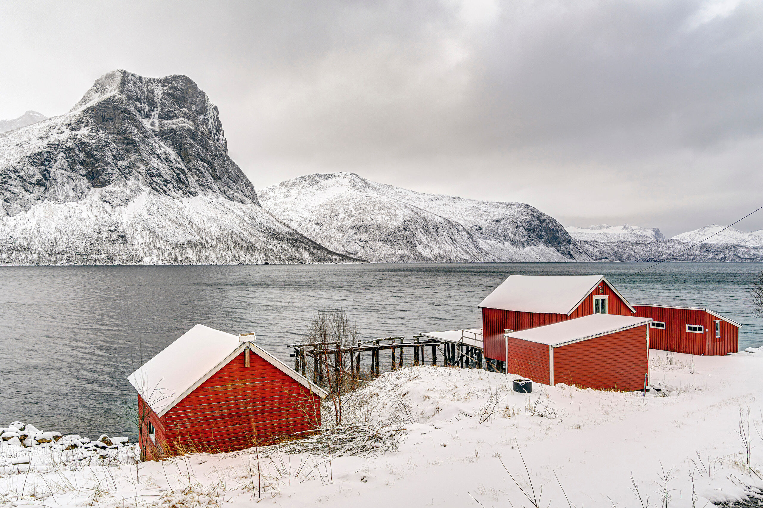 Black and White and Red Taken somewhere near the village of Skaland, this scene is fairly typical of much of the coast in Lofoten and Senja. Without...