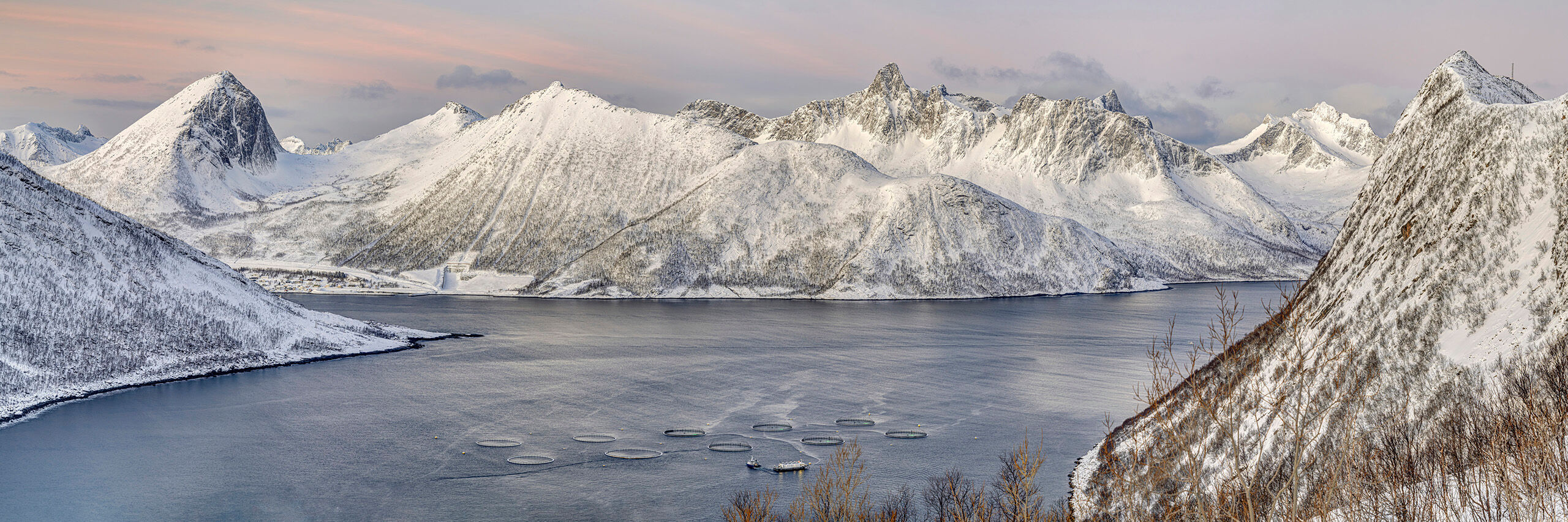 Salmon Farms in Senja Taken from the road to Husoy, Senja, Norway, and looking across the fjord to the aptly named village of Fjordgard, this was one...