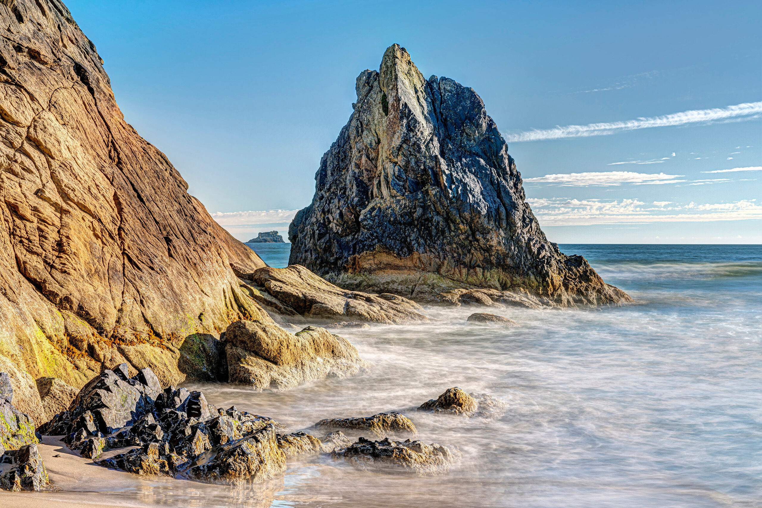 Hug Point Shore Hug Point, on Oregon's northern coast, is a great spot that isn't as popular or crowded as many of the other beaches in the area...
