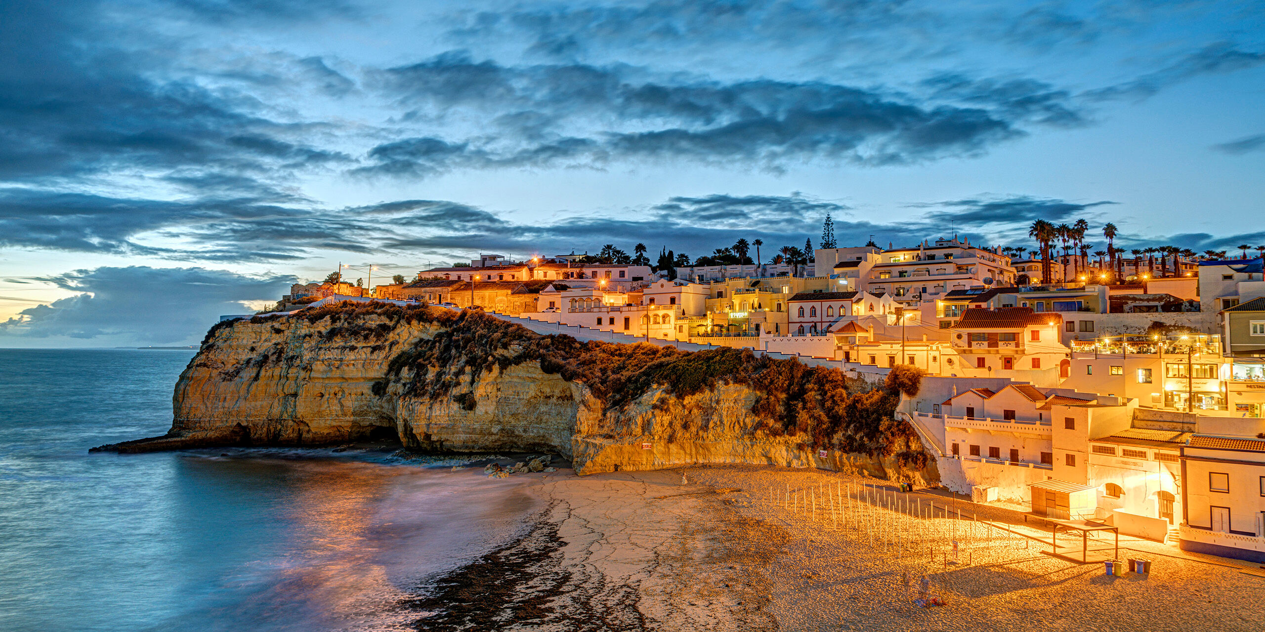 Carvoeiro Southern Portugal has some absolutely spectacular beaches and cute seaside villages, like Carvoeira, shown here. Like most of...