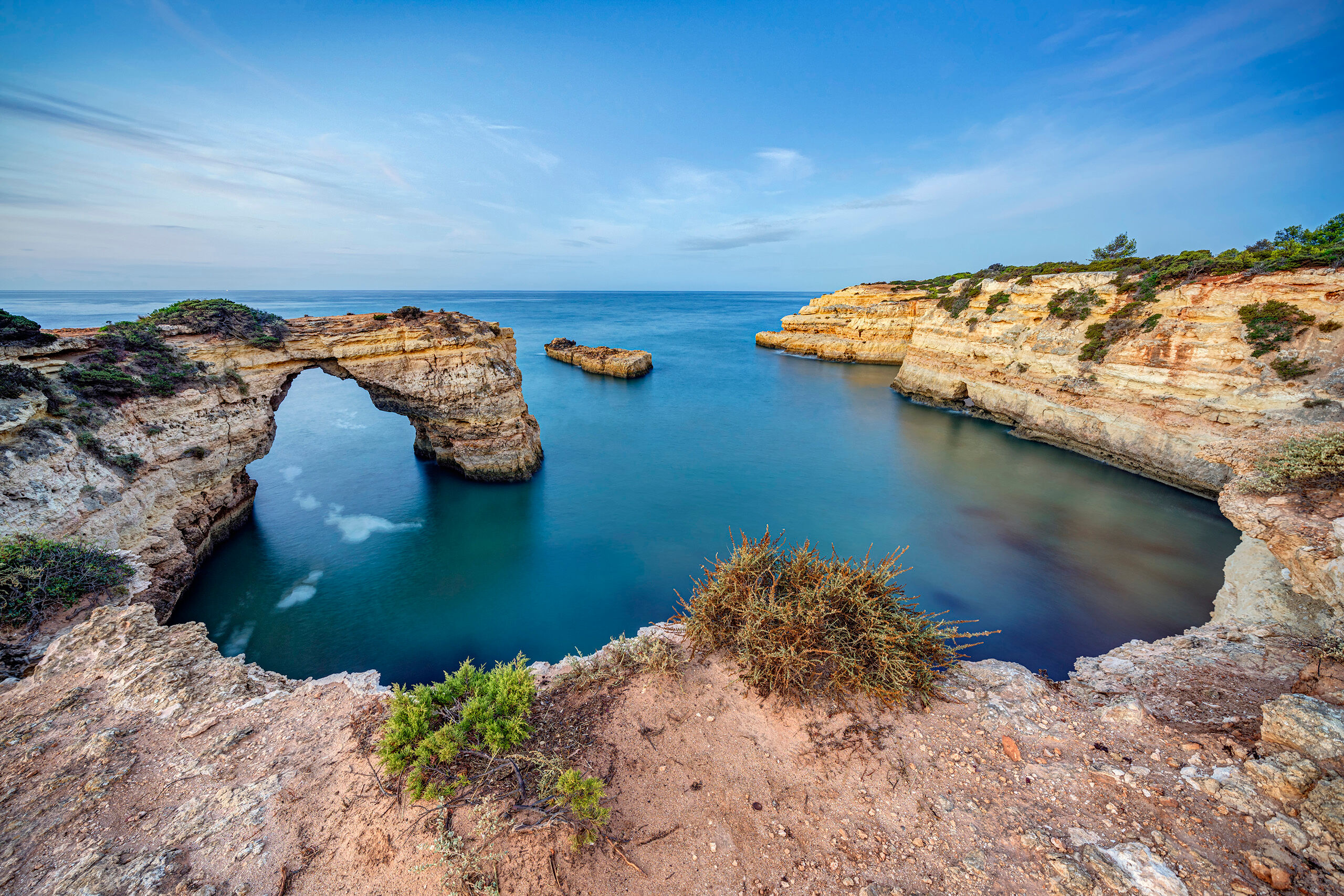 Dawn at Albandeira Arch Albandeira Beach is one of so many small beaches in southwestern Portugal that it is impossible to keep track of all of them....