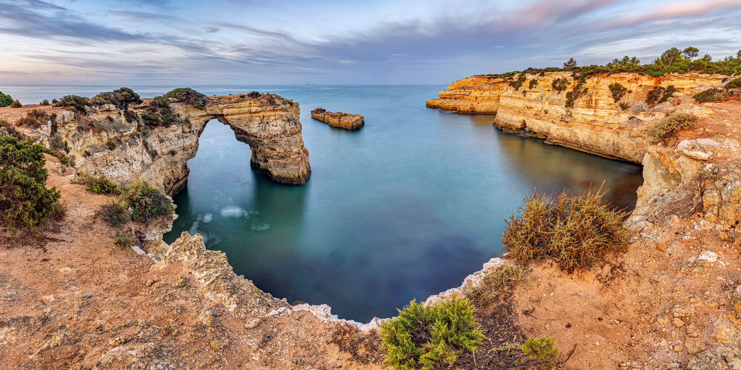 Sunrise at Albandeira Arch Albandeira Beach is one of so many small beaches in southwestern Portugal that it is impossible to keep track of all of them....