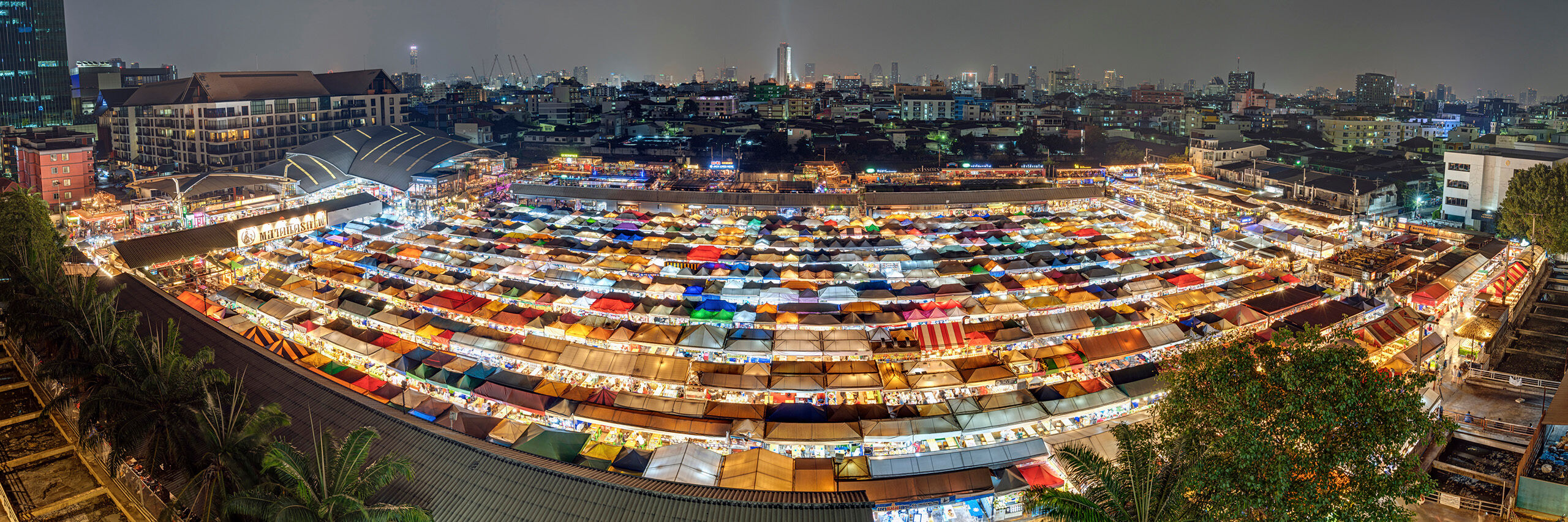 Talat Rotfai Night Market Panorama I visited Thailand in February 2020, just before the world went up in flames. The only time I'd been to Bangkok before was in...