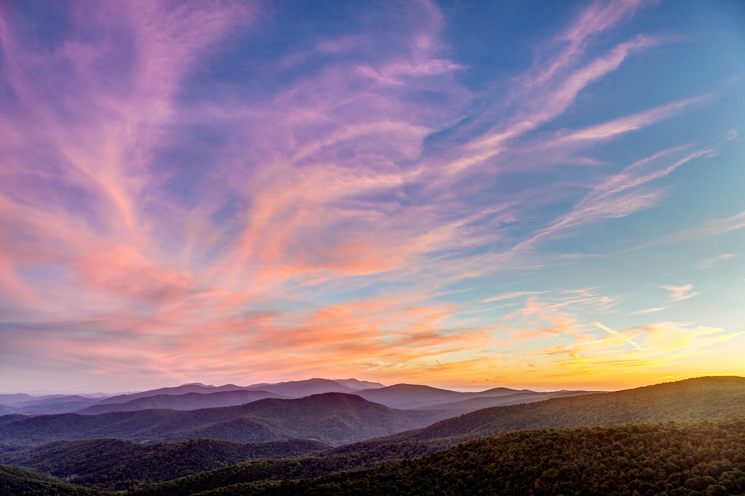 Skyline Drive Sunset Shenandoah National Park's Skyline Drive is a beautiful road through the forested mountains of the Shenandoah Range, in northern...