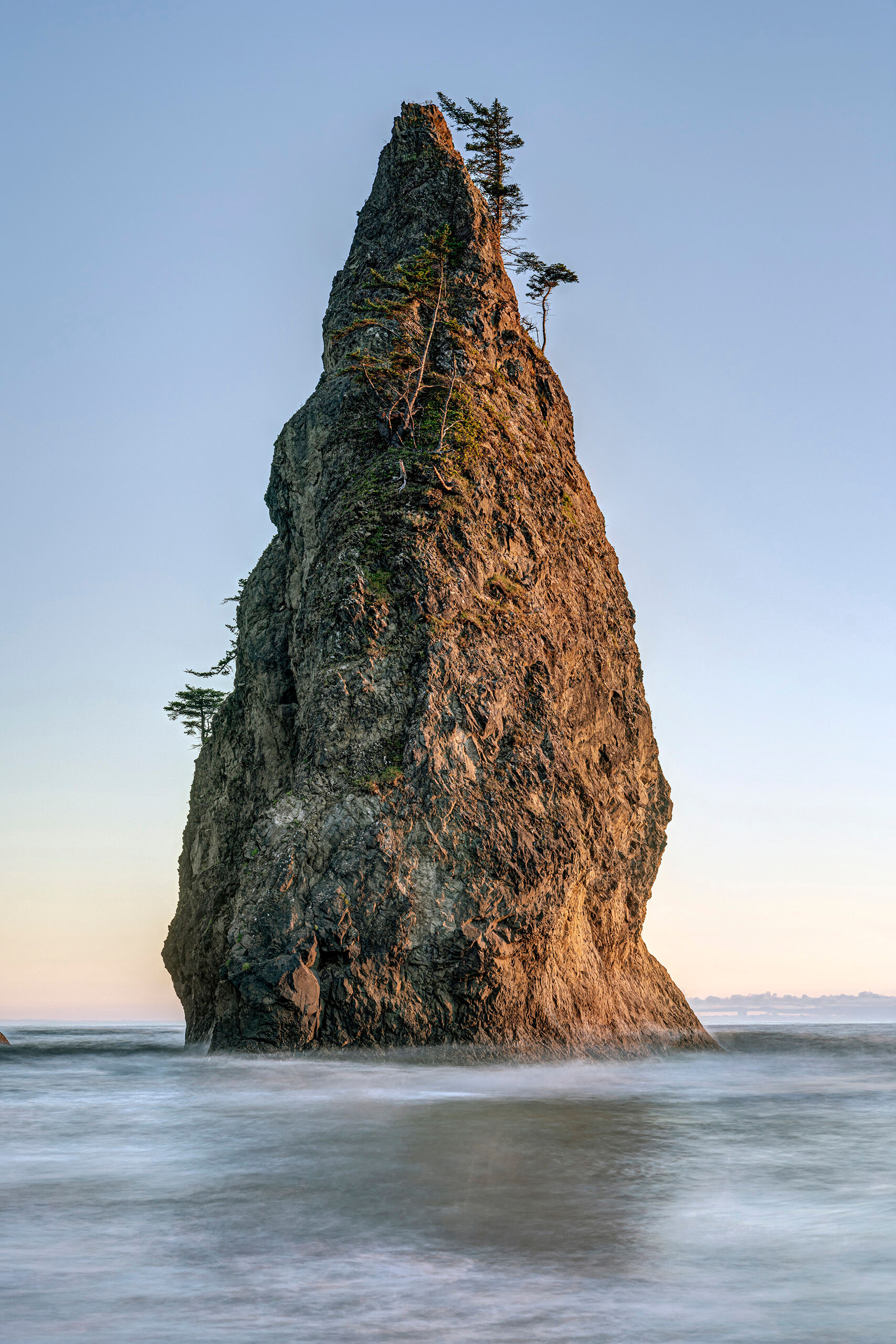 Sunlit Seastack Rialto Beach, which lies in northwest Washington, within the boundaries of Olympic National Park, is one of those rare beaches...